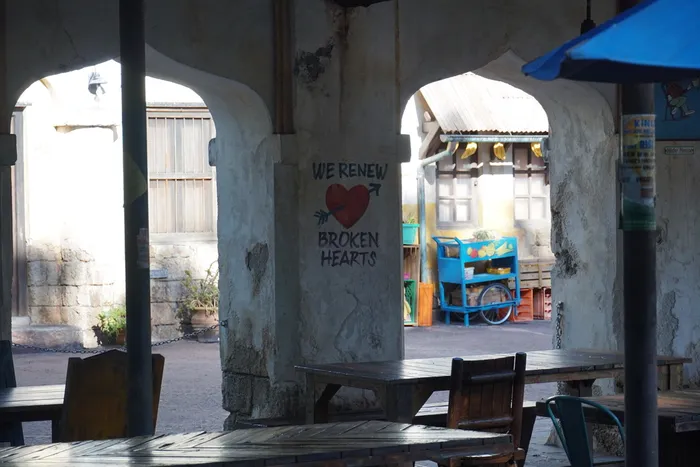 Wall art saying 'we renew broken hearts'